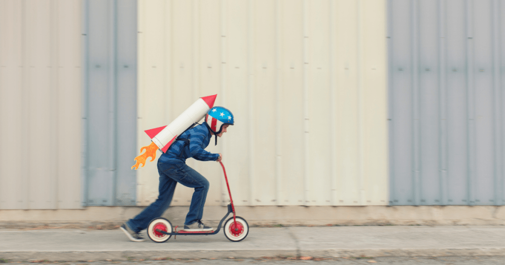 A boy speeding in a scooty with a rocket on his back. 5 Common Myths About Math. Speed is a measure of mathematical skill.