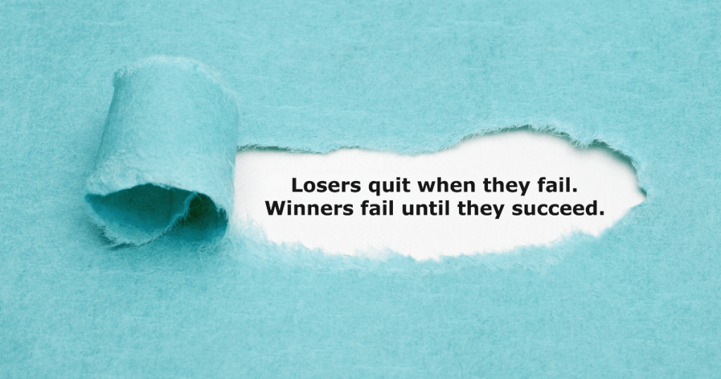 Paper torn, revealing the quote, losers quit when they fail, winners fail until they succeed. Things to do when you fail.